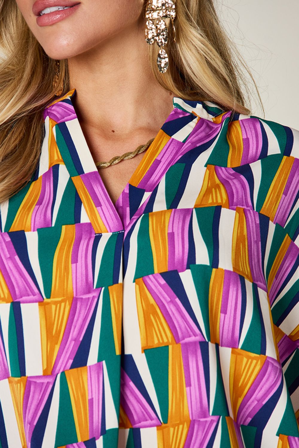 Dani Geometric Notched Dolman Sleeve Top