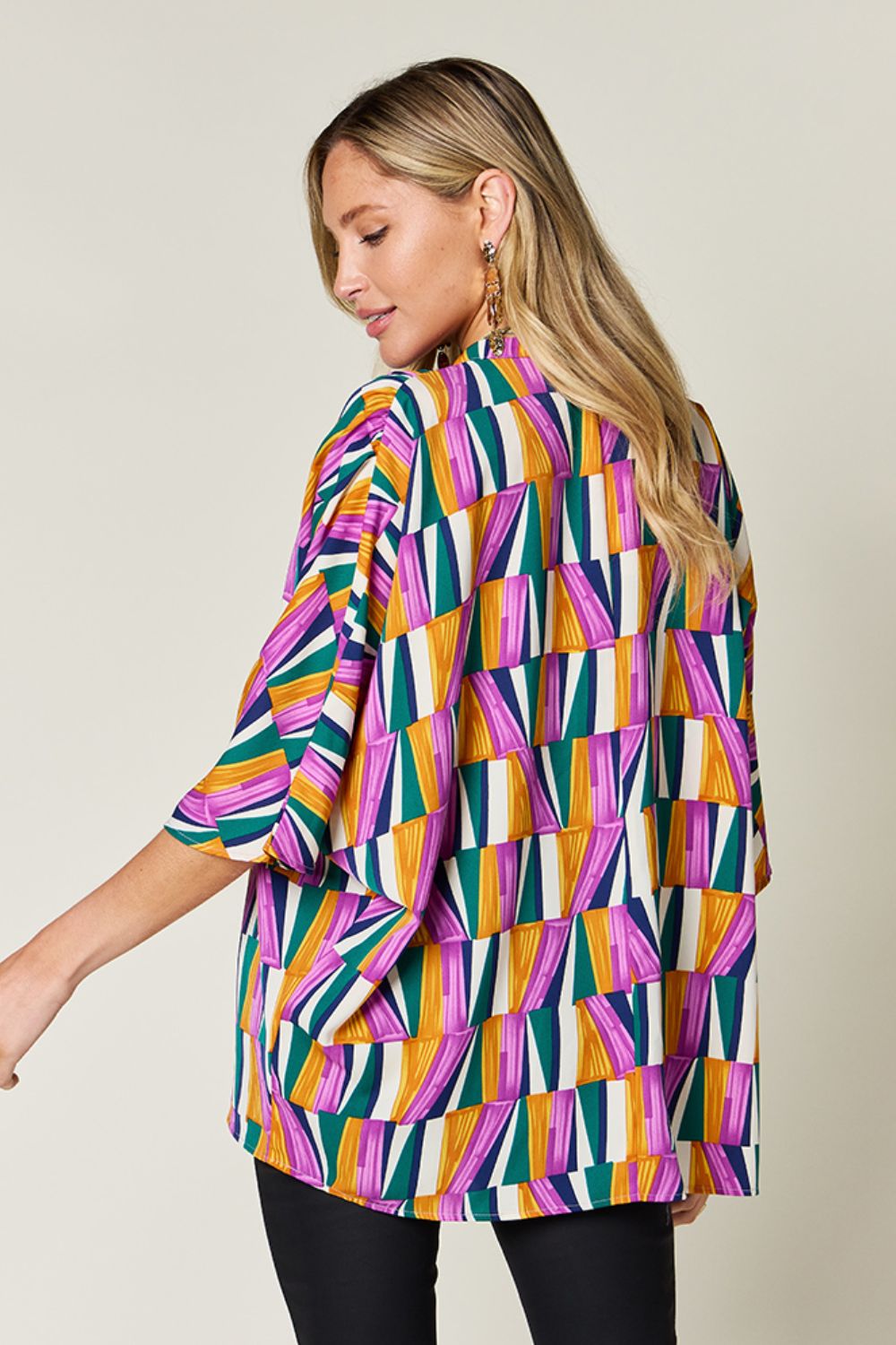 Dani Geometric Notched Dolman Sleeve Top