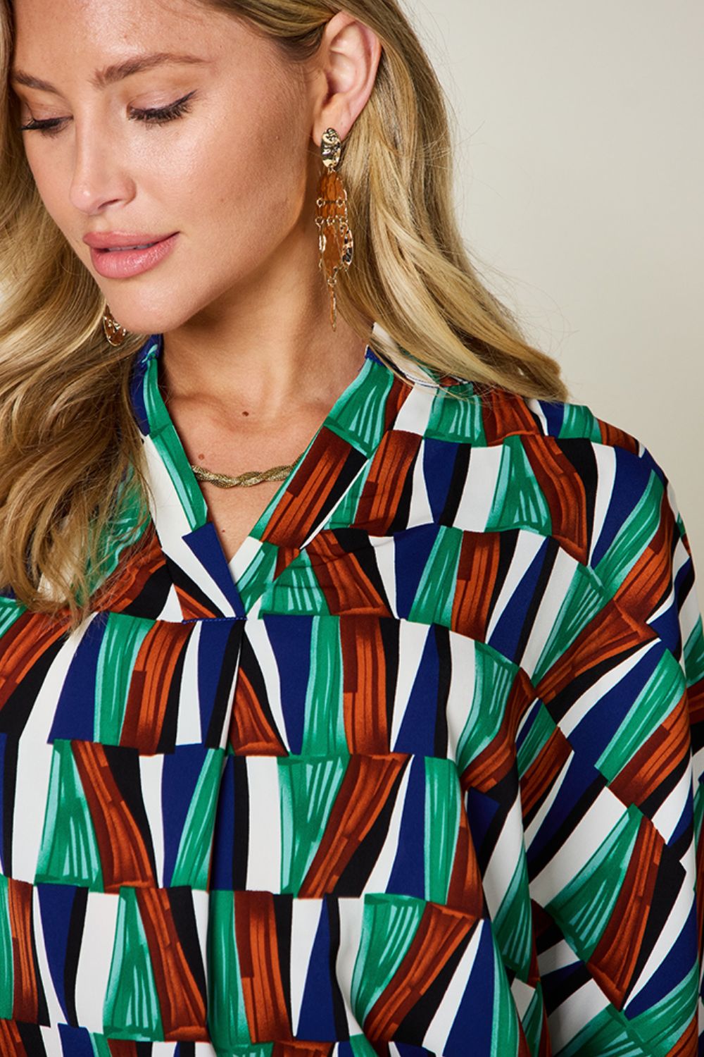 Dani Geometric Notched Dolman Sleeve Top